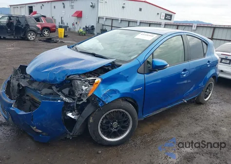 2014 Toyota Prius C Four from USA, damaged, VIN JTDKDTB31E1059467